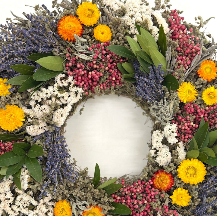 Carols Commemorative Wreath - Creekside Farms A beautiful combination of herbs, lavender, pepperberries and statice designed to honor Carol's legacy and represent key moments in Creekside Farms history.