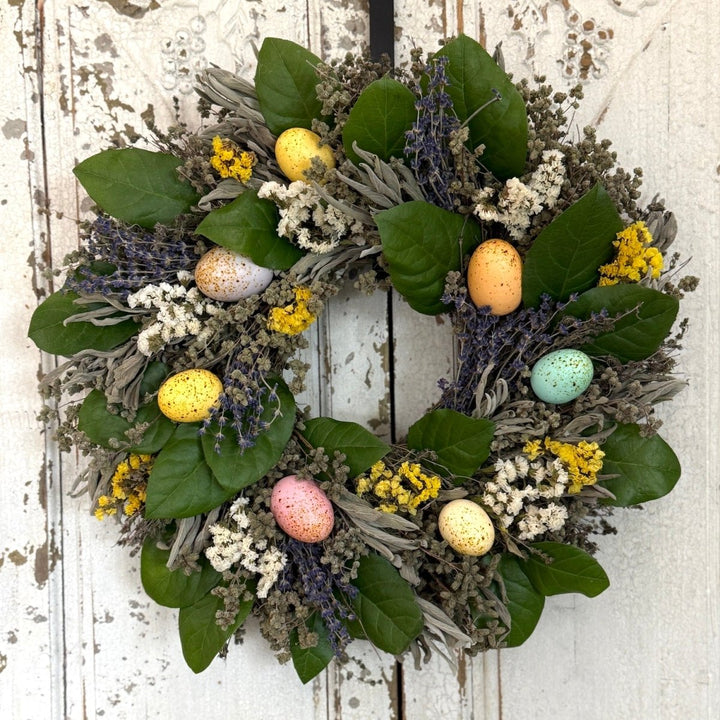 Delightful Easter Wreath - Creekside Farms Vibrant faux eggs are tucked into spring herbs and accented with fresh leaves in this Easter Wreath 18"