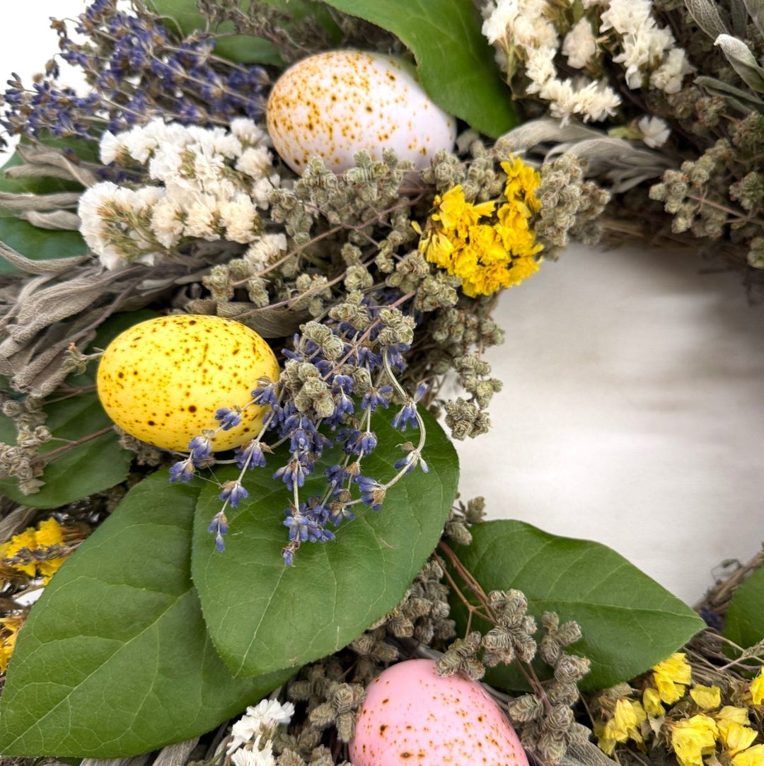 Delightful Easter Wreath - Creekside Farms Vibrant faux eggs are tucked into spring herbs and accented with fresh leaves in this Easter Wreath 18"