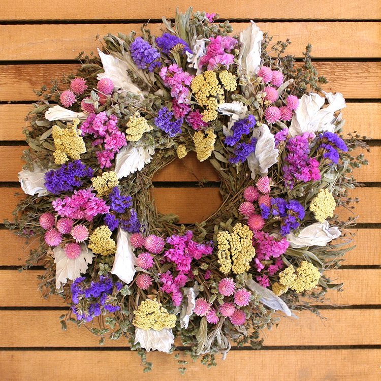 Floral Summer Wreath - Creekside Farms A beautiful combination of vibrant summer flowers make this colorful wreath.