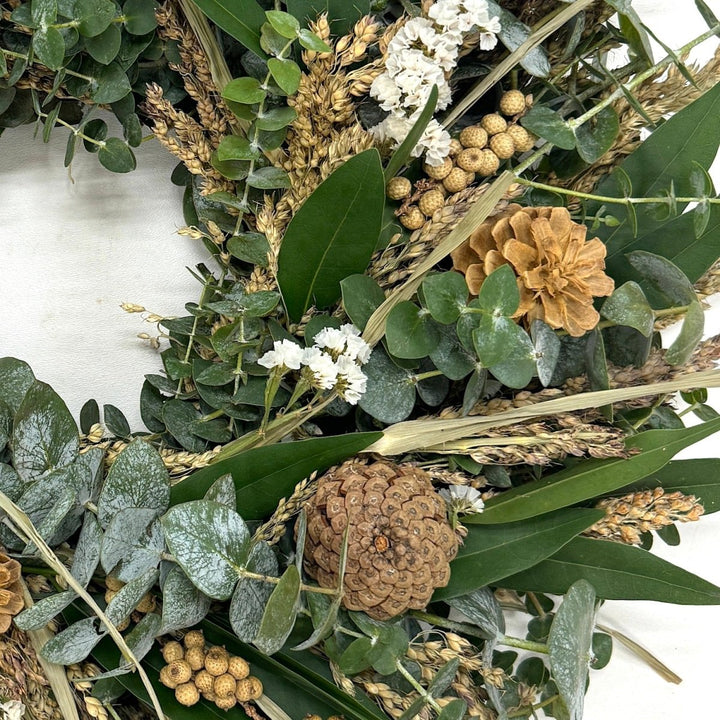 Soothing Fall Wreath - Creekside Farms A beautiful combination of fresh greens, autumn grains, pine cones, berries and statice wreath 18"/22"