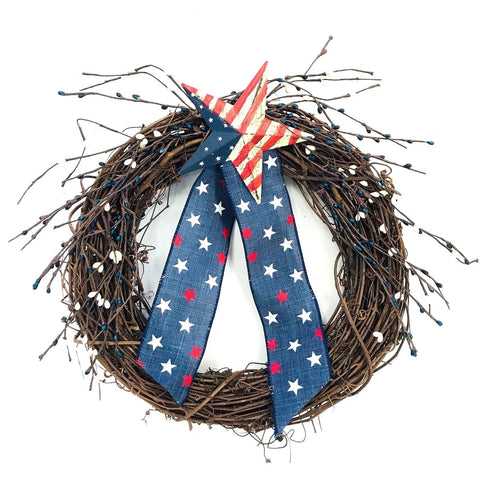 Americana Wreath - Creekside Farms The perfect Patriotic Wreath on a twig base decorated with a large star and ribbon 16"