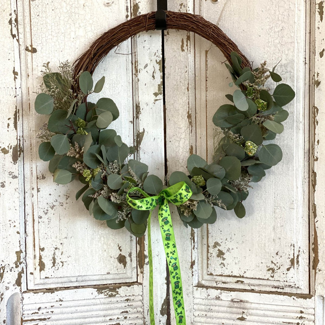 Charming St. Patrick's Day Wreath - Creekside Farms St. Patrick's Day ribbon finishes our fresh eucalyptus, dried caspia, and glittered leaves wreath 18"