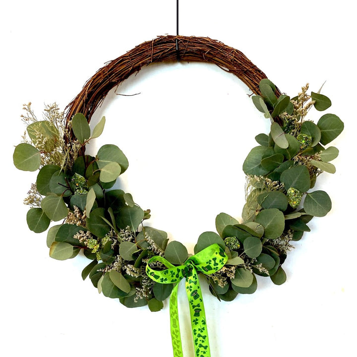 Charming St. Patrick's Day Wreath - Creekside Farms St. Patrick's Day ribbon finishes our fresh eucalyptus, dried caspia, and glittered leaves wreath 18"