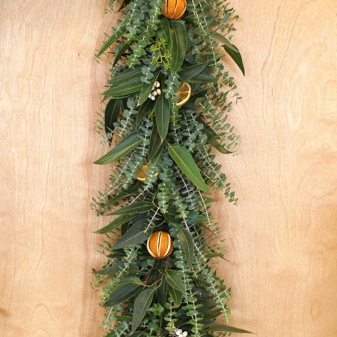 Eucalyptus Citrus Garland 6' - Creekside Farms Gorgeous mix of eucalyptus with tallow berries, orange slices & whole slit oranges garland 6'