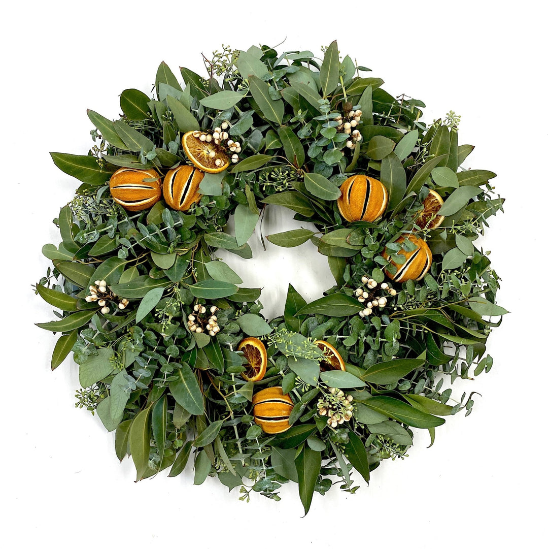 Eucalyptus Citrus Wreath - Creekside Farms Fresh mixed eucalyptus with tallow berries, orange slices and whole slit oranges wreath 20"