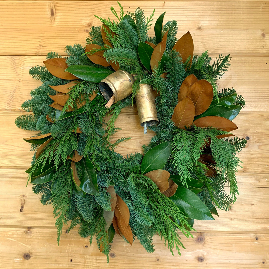 Fresh & Fragrant Bell Wreath - Creekside Farms Classic mixture of fresh fir, cedar, and magnolia adorned with two metal bells wreath 22"