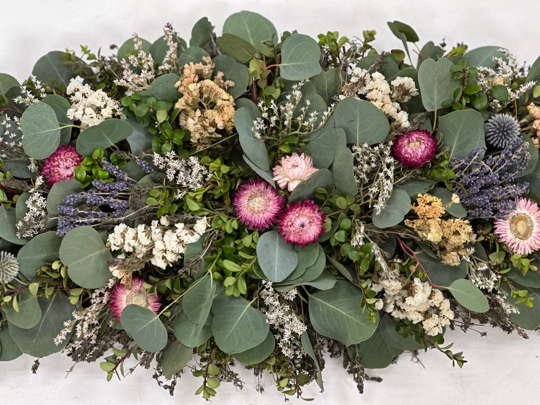 Botanical Centerpiece - Creekside Farms Beautiful combination of fresh eucalyptus and boxwood with dried lavender and sweet centerpiece 33x12"