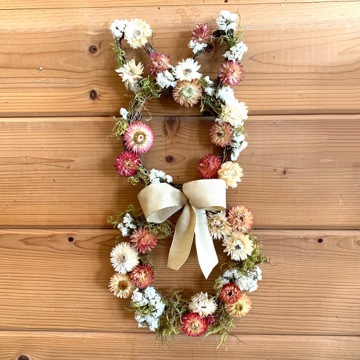 Spring Bunny Wreath - Creekside Farms Dried flowers and moss are perfect accents to this bunny shaped wreath 17x8"